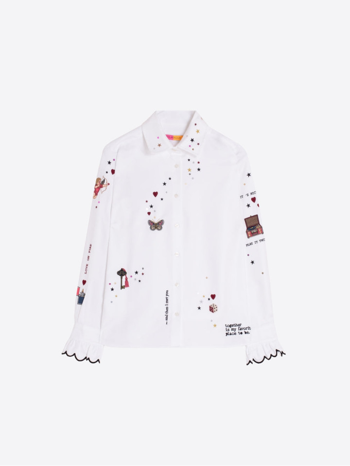 CAMISA BLANCA BORDADOS...